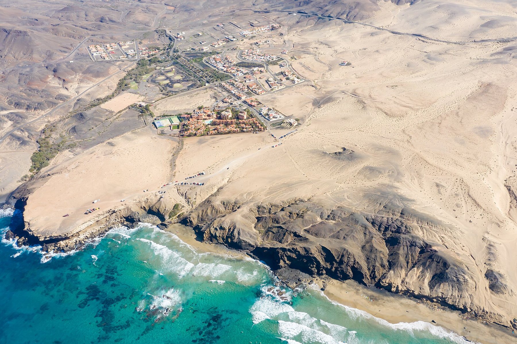 Aerial view of La Pared: village, cliff and surf beach