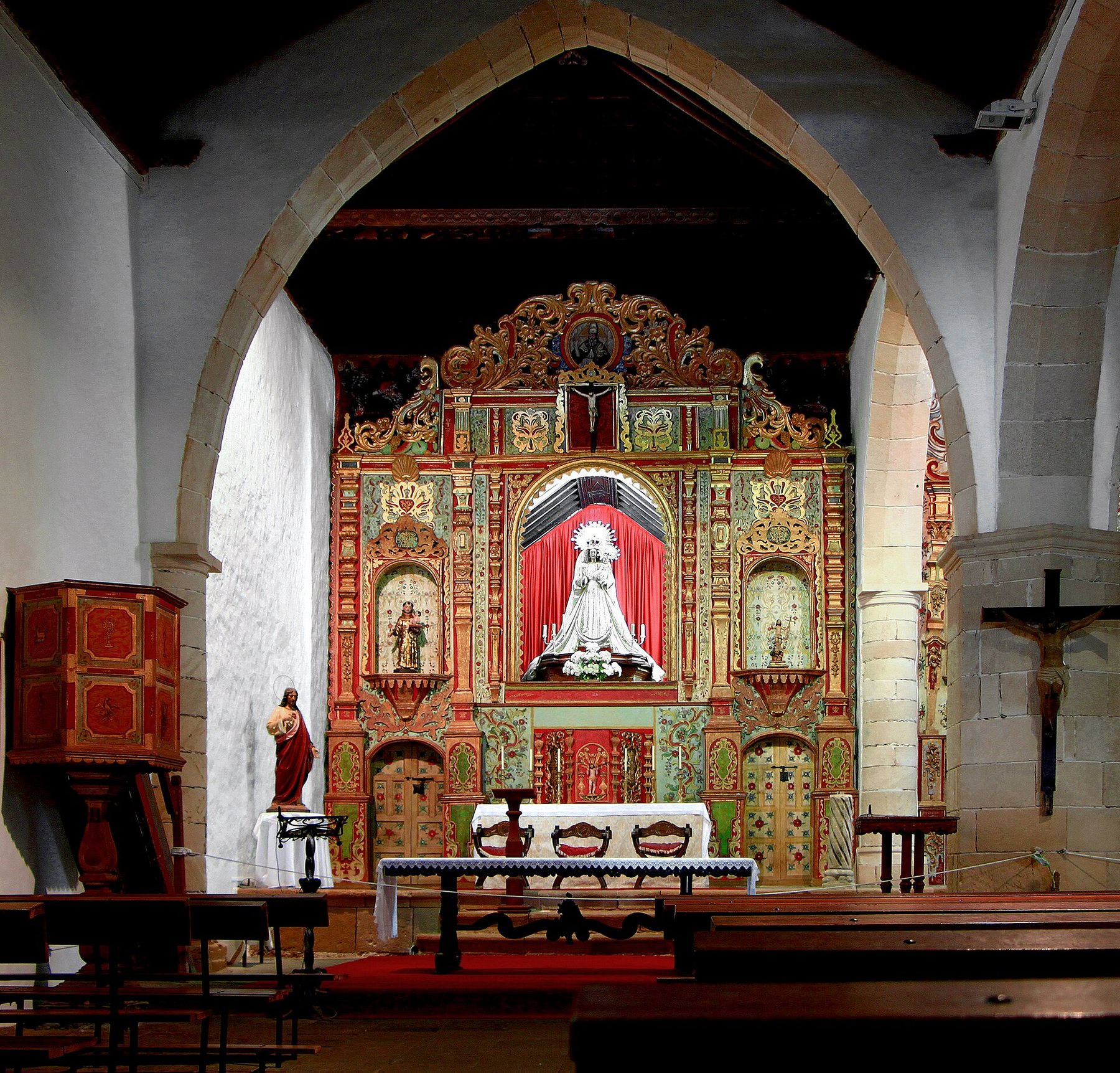 Interior of Nuestra Señora de Regla in Pájara, with the altarpiece and statue
